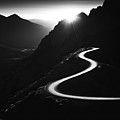 Mountain Highway Snakes Through Sunrise